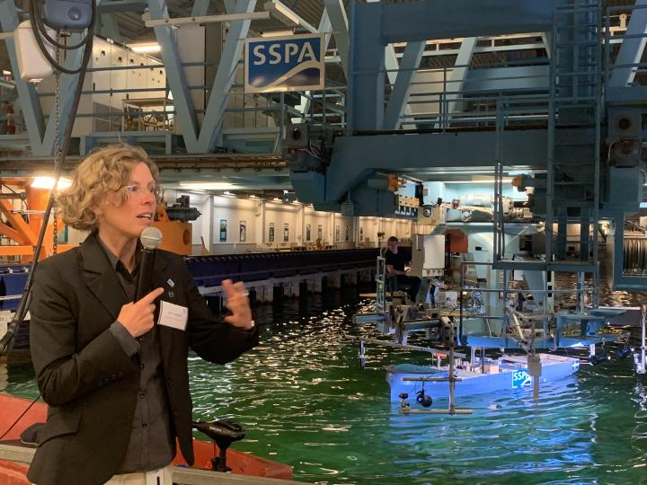 Sofia Werner demonstrating an early version of the Orcelle concept in the maritime dynamics laboratory at SSPA  Maritime Center